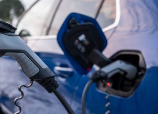 How to lower the cost of EV insurance Car plug TotallyEV