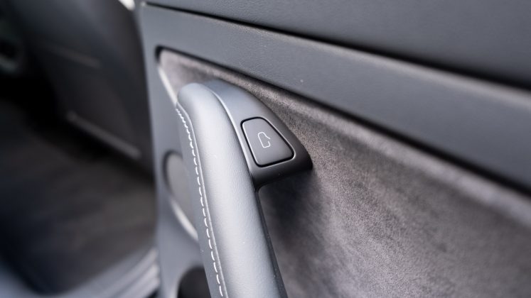 Tesla Model 3 rear door button