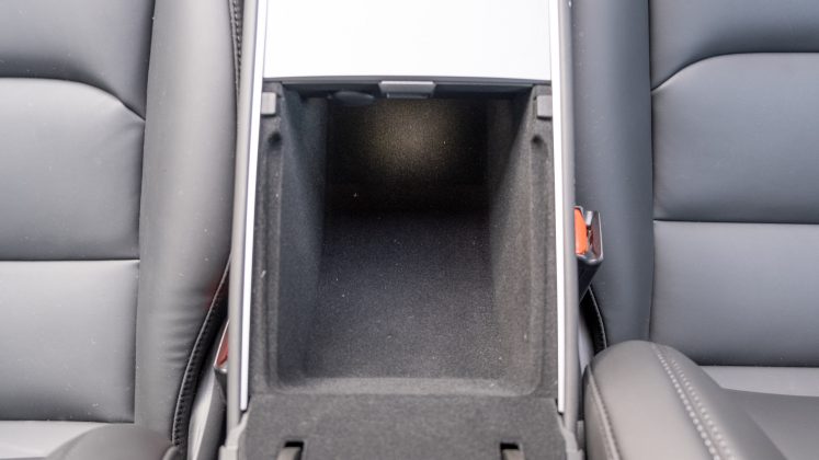 Tesla Model Y armrest storage