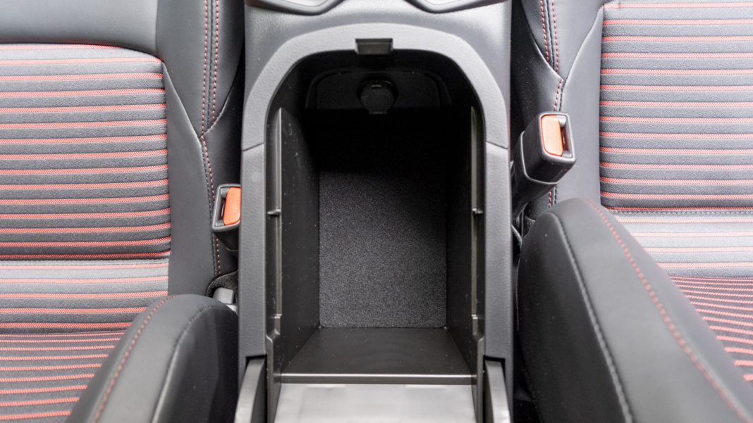 Suzuki Across centre armrest storage