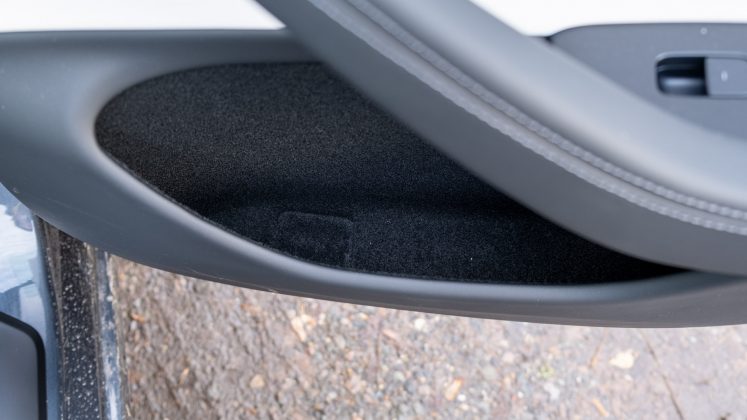 New Tesla Model 3 rear door compartment